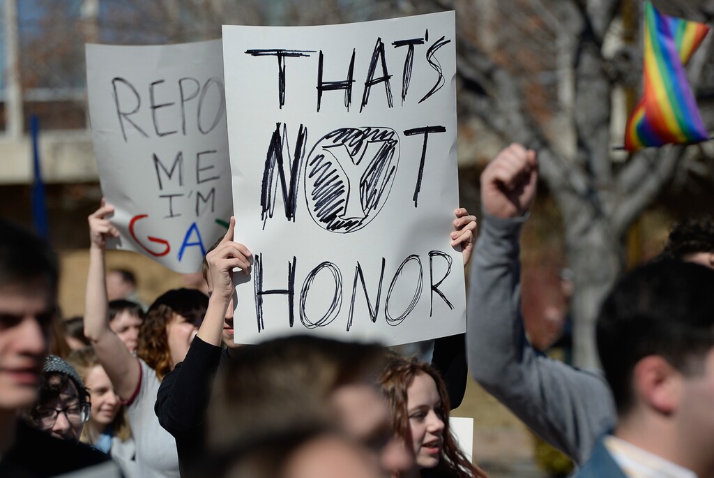 (Francisco Kjolseth | The Salt Lake Tribune) Students protest outside the student center at Brigham Young University in Provo, Utah, on Wednesday, March 4, 2020, after an official with the Church of Jesus Christ of Latter-day Saints school issued a clarification to the school's Honor Code, which said that same-sex romantic behavior is still "not compatible" with the rules at BYU. Brigham Young University says “same-sex romantic behavior” isn't allowed on campus, even under recent changes to its strict code of conduct.