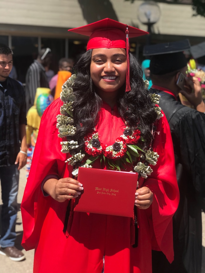 (Photo courtesy of Angie Lotulelei) Sondra Lotulelei graduated from West High School on June 6, 2018. The Salt Lake City School District held its ceremonies at the Huntsman Center, which banned leis from the floor this year.Pacific Islander students, when allowed, typically wear one or two fresh leis during their graduation to honor their heritage. Relatives then pile more on after the ceremony, in celebration.