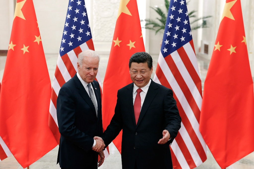 (AP Photo/Lintao Zhang, Pool, File)

In this Dec. 4, 2013, file photo, Chinese President Xi Jinping, right, shakes hands with then-U.S. Vice President Joe Biden as they pose for photos at the Great Hall of the People in Beijing.