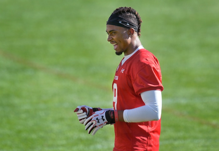 Scott Sommerdorf | The Salt Lake Tribune
New Utah WR Darren Carrington II smiles as he walks off the field after the first day of Utah fall football camp, Friday, July 28, 2017. during the first day of Utah fall football camp, Friday, July 28, 2017.