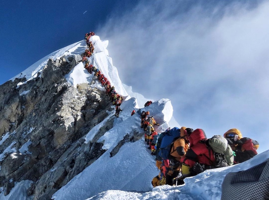 (Nirmal Purja/@Nimsdai Project Possible via AP) In this photo made on May 22, 2019, a long queue of mountain climbers line a path on Mount Everest. About half a dozen climbers died on Everest last week most while descending from the congested summit during only a few windows of good weather each May.