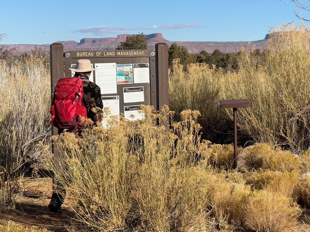 (Dave Marston | Writers on the Range) Hiker near Hite, Utah.