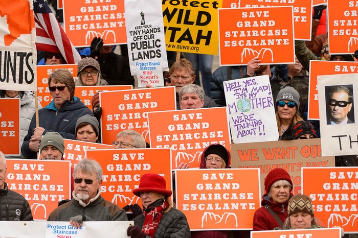 (Trent Nelson | The Salt Lake Tribune) Citizens with signs at a rally on the steps of the State Capitol Building in Salt Lake City against Rep. Chris Stewart's Grand Staircase bill that would create an Escalante National Park. Tuesday December 12, 2017.