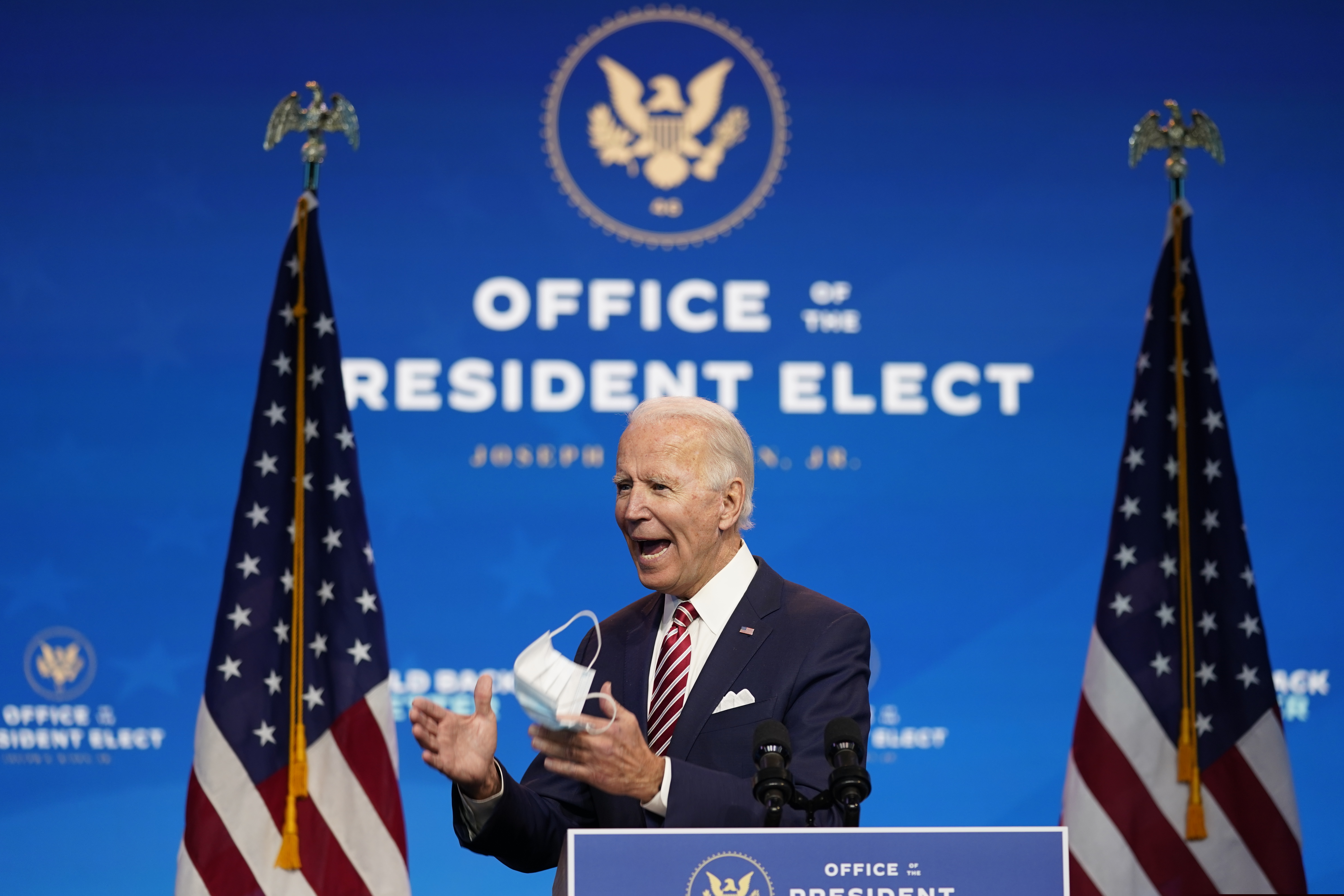 (Andrew Harnik | AP)  President-elect Joe Biden, accompanied by Vice President-elect Kamala Harris, speaks about economic recovery at The Queen theater, Monday, Nov. 16, 2020, in Wilmington, Del.