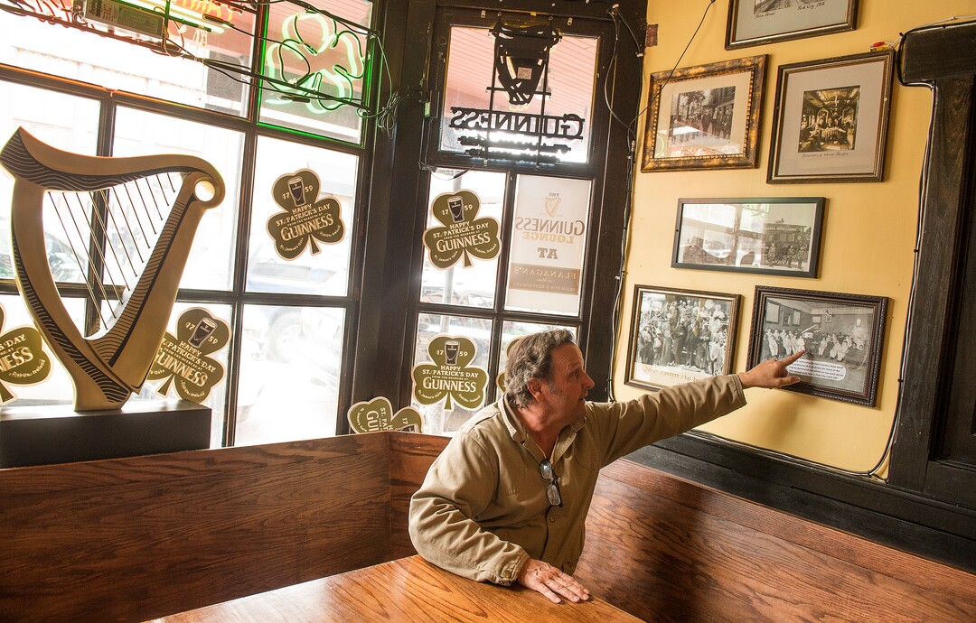 Leah Hogsten  |  The Salt Lake Tribune
John Kenworthy, owner of Flanagan's on Main, points out his grandfather in the photos that adorn the walls of the Irish Pub in Park City.