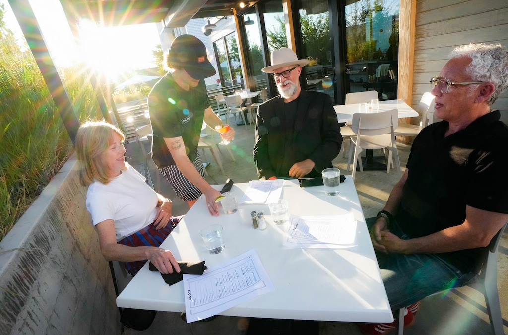 (Francisco Kjolseth | The Salt Lake Tribune) Zack Ingwersen serves Fraser Nelson, "Bad" Brad Wheeler and Dee Brewer during a recent visit to Publik Kitchen at 931 E. 900 South in Salt Lake City, Saturday, Sept. 13, 2025.