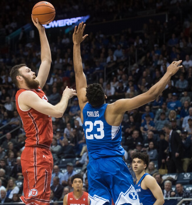(Rick Egan  |  The Salt Lake Tribune)   Utah Utes forward David Collette (13) shoots overBrigham Young Cougars forward Yoeli Childs (23), in basketball action Utah Utes vs. Brigham Young Cougars at the Marriott Center in Provo, Saturday, December 15, 2017.