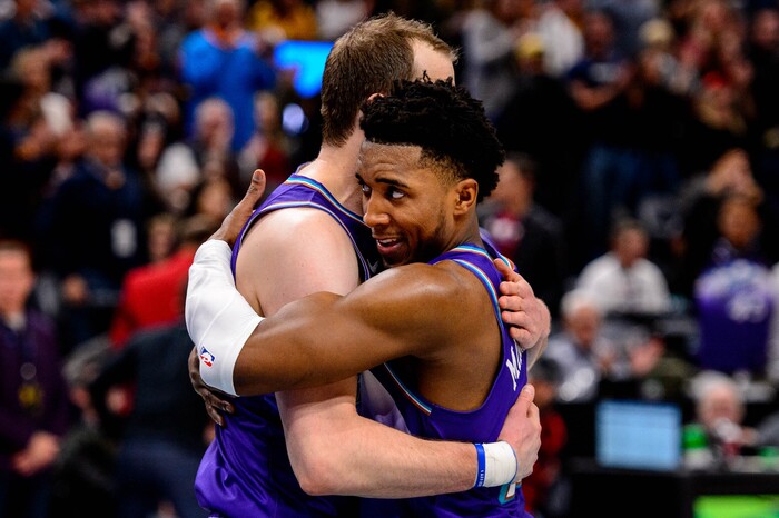 (Trent Nelson  |  The Salt Lake Tribune) Utah Jazz forward Joe Ingles (2) and Utah Jazz guard Donovan Mitchell (45) embraces after the game as the Utah Jazz host the Portland Trail Blazers, NBA basketball in Salt Lake City on Thursday, Dec. 26, 2019.