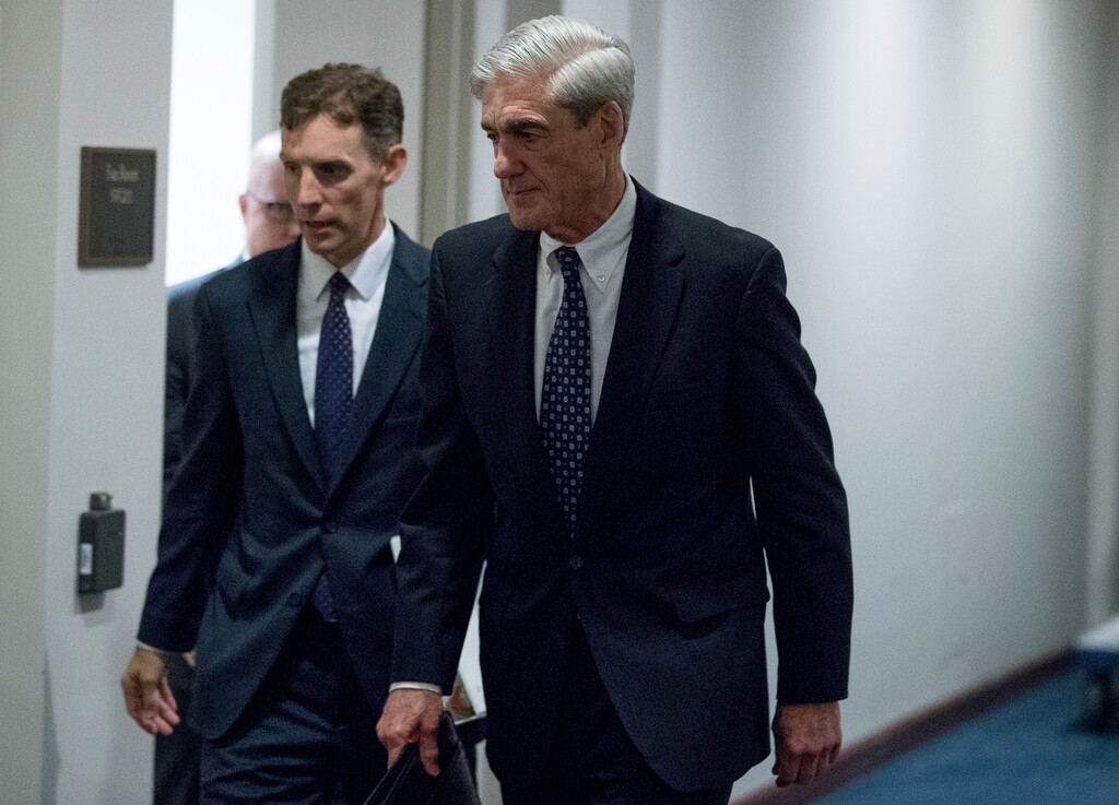 FILE - In this June 21, 2017, file photo, special counsel Robert Mueller departs Capitol Hill following a closed door meeting in Washington. Mueller’s team of investigators has recently questioned a former British spy who compiled a dossier of allegations about President Donald Trump’s ties to Russia. (AP Photo/Andrew Harnik)