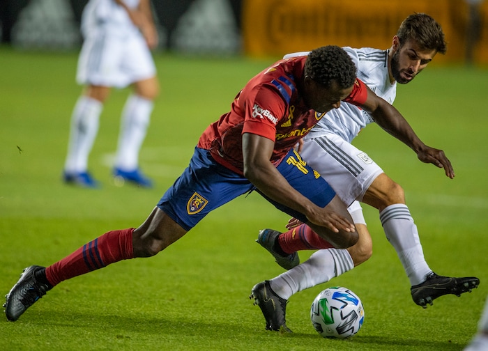 (Rick Egan  |  The Salt Lake Tribune). Real Salt Lake defender Nedum Onuoha (14) goes for the ball along with Los Angeles FC forward Diego Rossi (9), in MLS soccer action between Real Salt Lake and Los Angeles FC at Rio Tinto Stadium, on Wednesday, Sept. 9, 2020.



