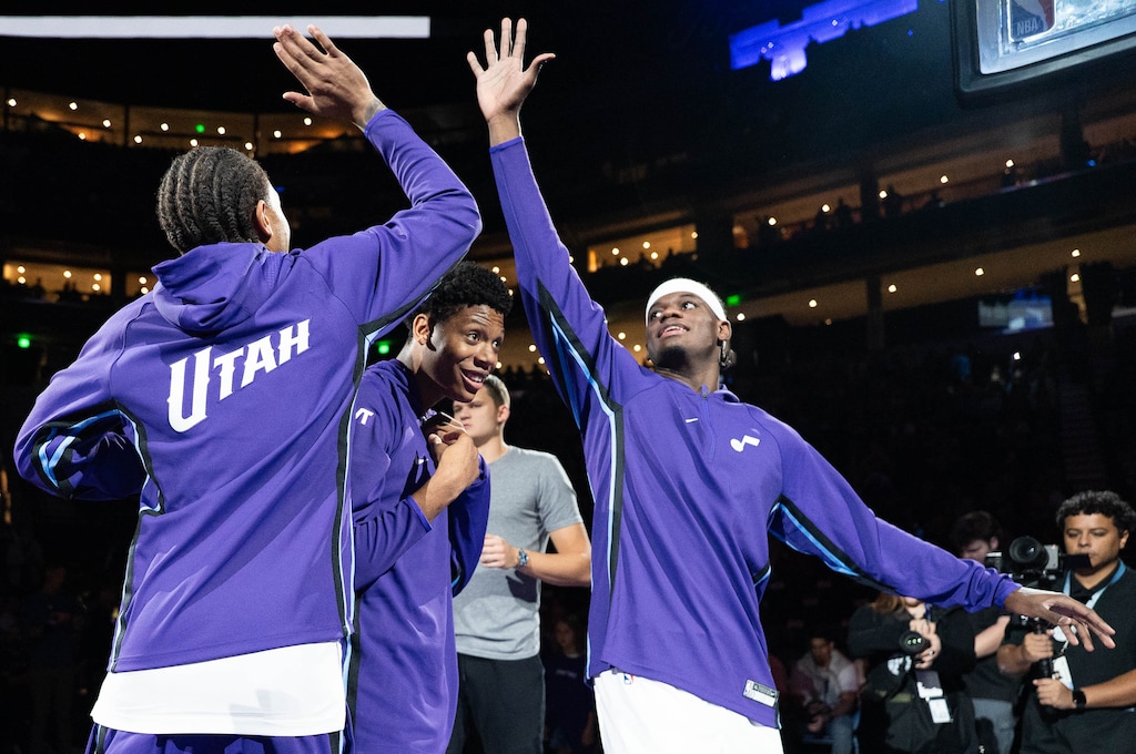 (Francisco Kjolseth | The Salt Lake Tribune) Utah Jazz forward Ace Bailey (19), center, finds himself between teammates Utah Jazz guard Keyonte George (3) and Utah Jazz forward Taylor Hendricks (0) during team introductions in Salt Lake City on Monday, Oct. 13, 2025.