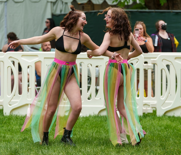(Leah Hogsten | The Salt Lake Tribune)  Best friends Hannah Reed and Hailey Heaps dance and celebrate the Utah Pride Festival at Washington Square, Saturday, June 4, 2022. 