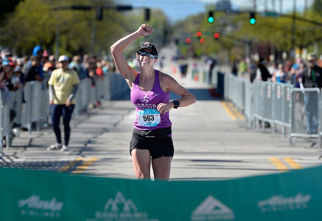 Scott Sommerdorf | The Salt Lake TribuneKristen Olsen reacts as she is about to cross the finish line as the female winner of the 2017 Salt Lake Marathon, Saturday, April 22, 2017. 