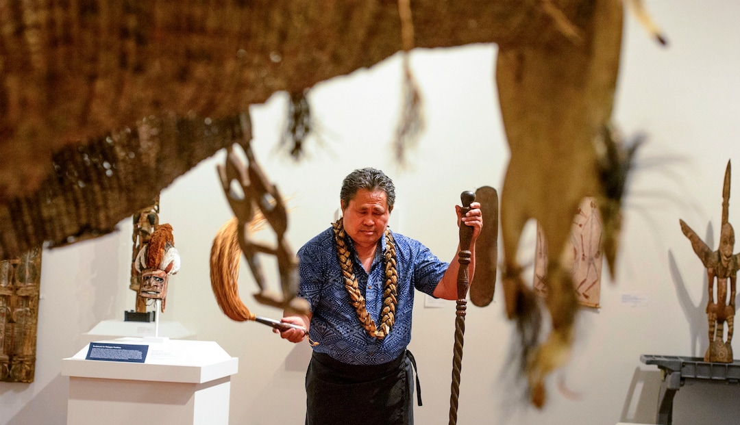 (Steve Griffin  |  The Salt Lake Tribune)  High Talking Chief Namulauulu Tavan joins members of Salt Lake City's Pacific Islander community as he blesses the Arts of the Pacific gallery in the newly renovated Utah Museum of Fine Arts on the University of Utah campus in Salt Lake City Tuesday August 8, 2017.  Elders from the local Maori and Samoan communities performed ceremonial dances, chants and oration to welcome the objects back on view and to thank Museum staff for continued care of their cultural objects.