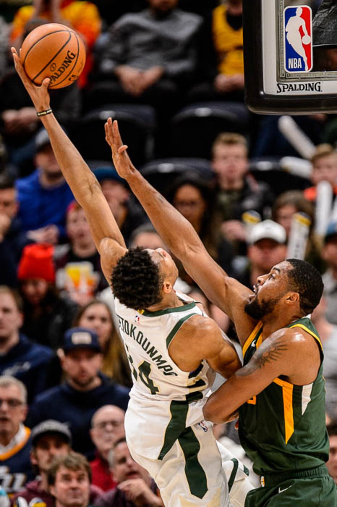 (Trent Nelson | The Salt Lake Tribune)  Utah Jazz forward Derrick Favors (15) defending Milwaukee Bucks forward Giannis Antetokounmpo (34) as the Utah Jazz host the Milwaukee Bucks, NBA basketball in Salt Lake City on Saturday March 2, 2019.