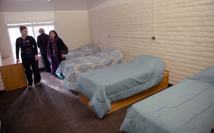 (Al Hartmann | The Salt Lake Tribune)
People tour a bedroom at a new Odyssey House treatment facility opened on Thursday, Jan. 11 at 3944 S. 400 E. in Millcreek.