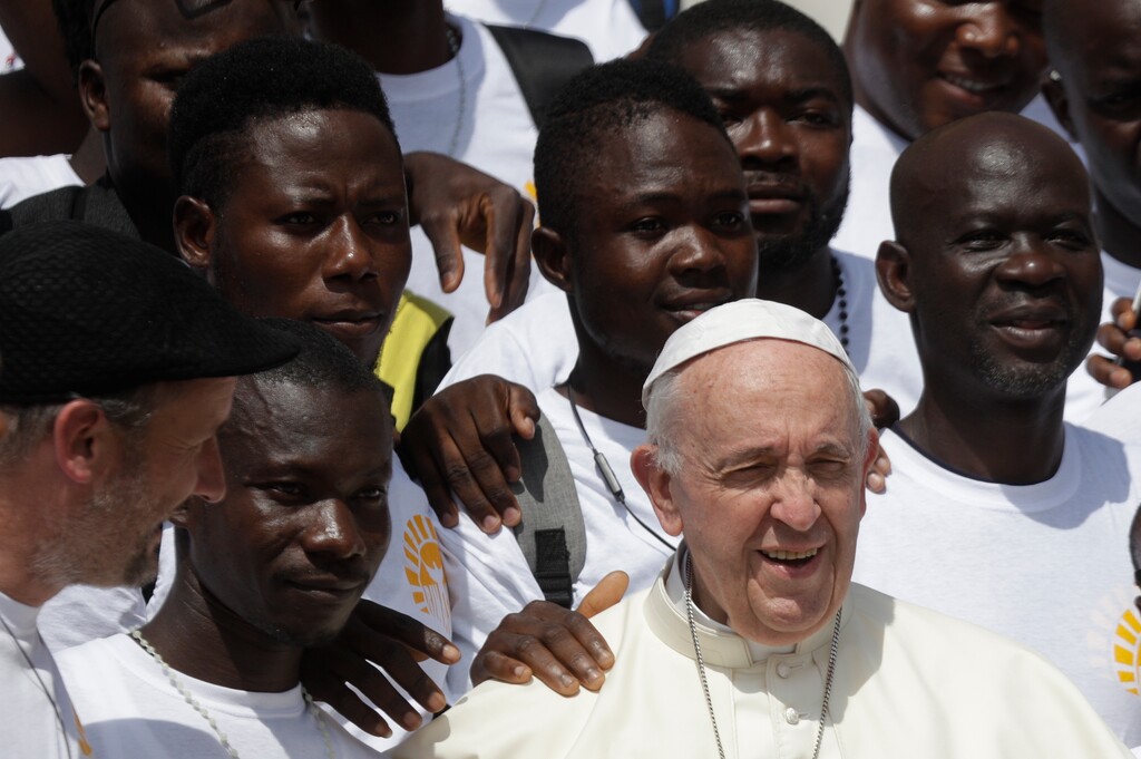 (AP Photo/Gregorio Borgia) Pope Francis poses with a group of faithful as he leaves after his weekly general audience in St. Peter's Square at the Vatican, Wednesday, June 6, 2018.