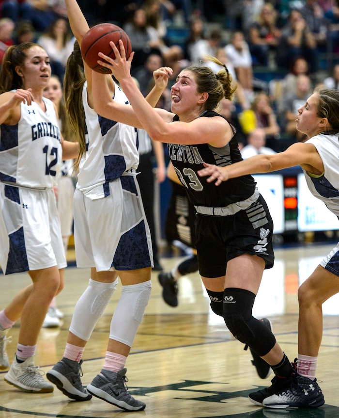 (Steve Griffin  |  The Salt Lake Tribune)  Riverton's Morgan Kane gets free under the basket during the Riverton versus Copper Hills girl's basketball game at Cooper Hill s High School in West Jordan Thursday February 1, 2018.