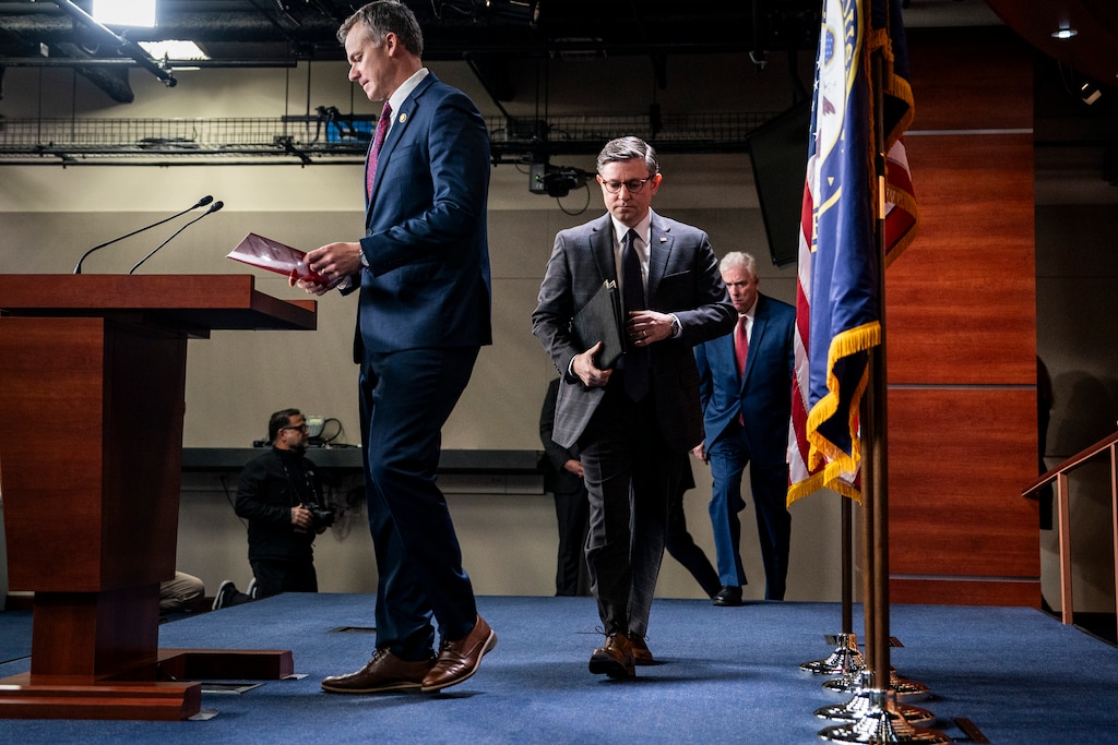 (Haiyun Jiang | The New York Times) House Speaker Mike Johnson, R-La., center, along with House Majority Whip Tom Emmer, R-Minn., right, and Rep. Blake Moore, R-Utah, arrives for a press conference on Capitol Hill on Tuesday, November 19, 2024.