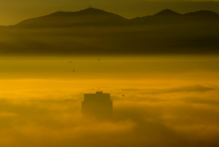 (Steve Griffin  |  The Salt Lake Tribune) The LDS Church Office Building rises from dense fog as an inversion settles over the Salt Lake Valley Tuesday December 26, 2017.