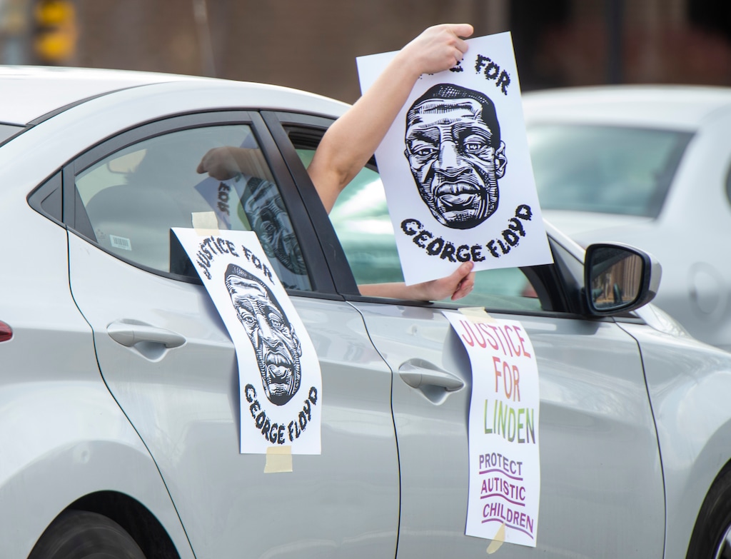(Rick Egan | The Salt Lake Tribune) demonstrators honk their horns as they drive in downtown Salt Lake City, during a rally for justice for George Floyd, in solidarity with Minneapolis, as Derek Chauvin's trail starts on Monday, the rally was sponsored by Utah Against Police Brutality, on Saturday, March 6, 2021.