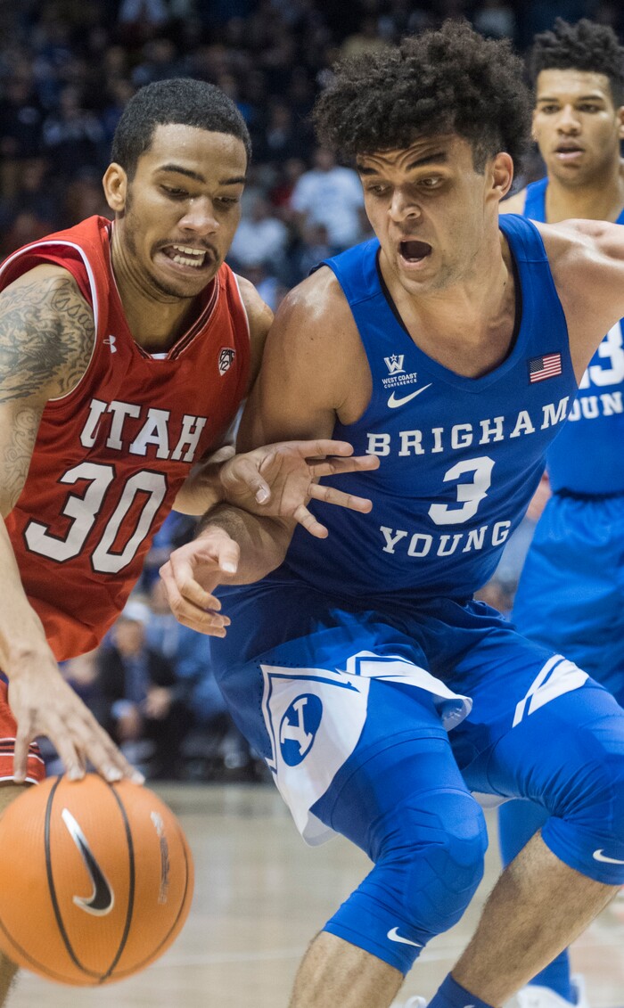 (Rick Egan  |  The Salt Lake Tribune)   Utah Utes guard Gabe Bealer (30) tries to take the ball inside, as Brigham Young Cougars guard Elijah Bryant (3) defends, in basketball action Utah Utes vs. Brigham Young Cougars at the Marriott Center in Provo, Saturday, December 15, 2017.


