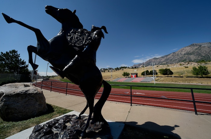 (Scott Sommerdorf   |  The Salt Lake Tribune)   The school's mascot greets visitors on their way to the stands at Weber High football field, Wednesday, August 9, 2017.  