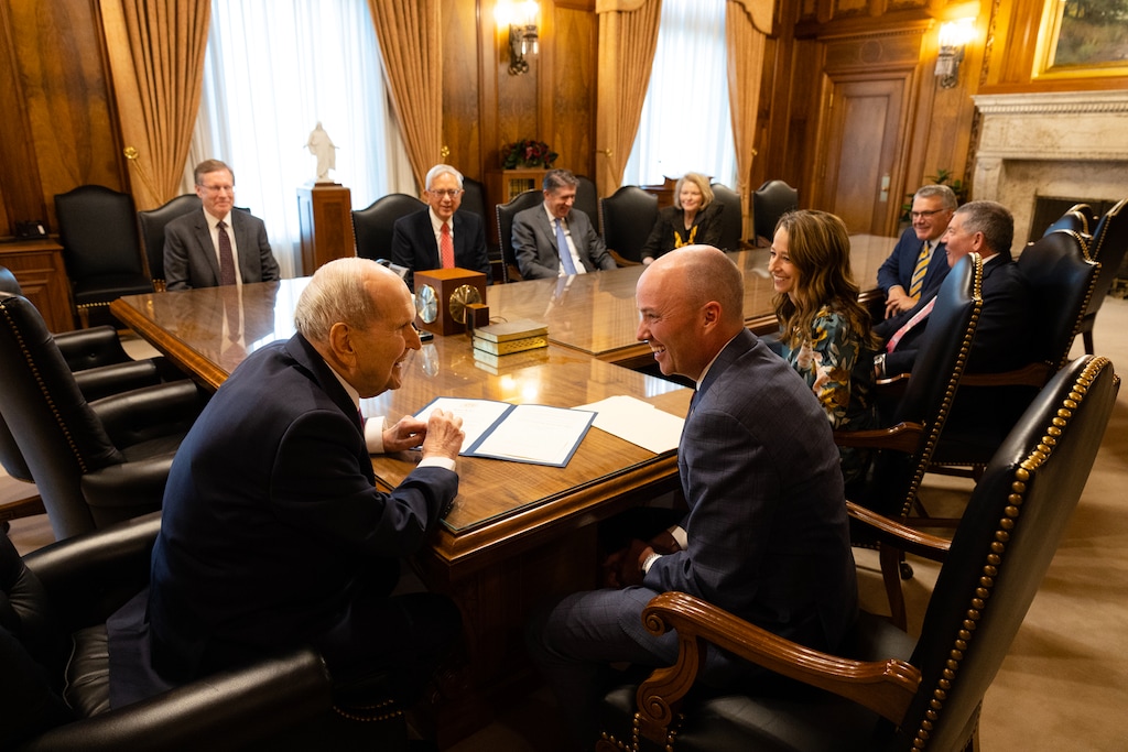 (The Church of Jesus Christ of Latter-day Saints) Utah Gov. Spencer J. Cox, right, declared Sept. 9, 2024, “President Russell M. Nelson Day” in Utah. Cox and his wife, Abby, shared the news with President Russell M. Nelson in the Church Administration Building on Temple Square on Thursday, Sept. 5, 2024. The church president died Sept. 27, 2025.
