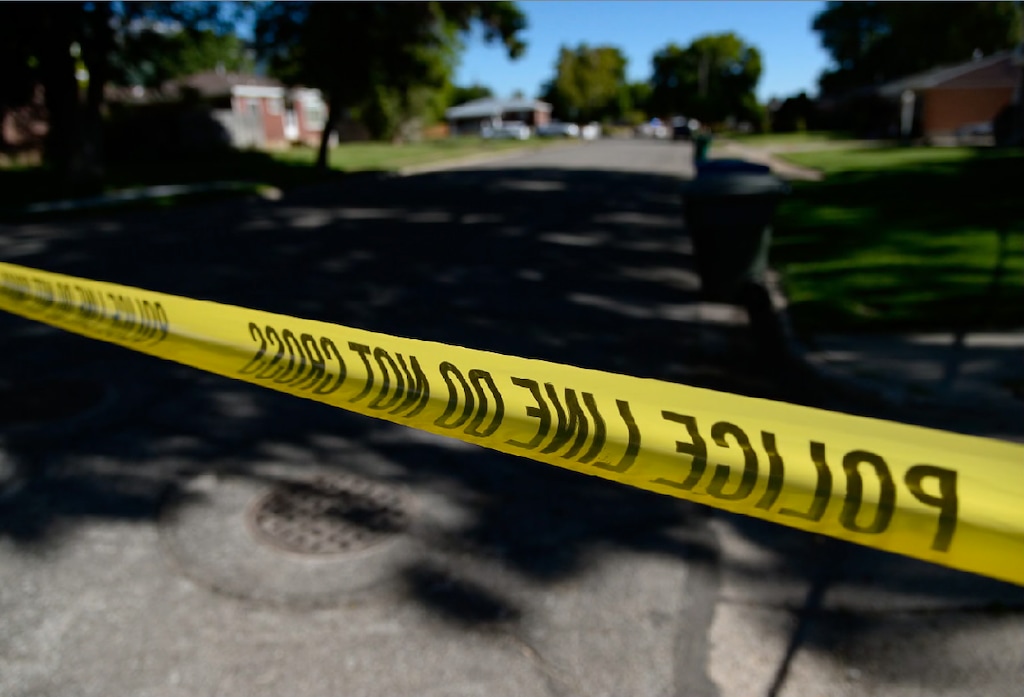 (Francisco Kjolseth | The Salt Lake Tribune) Ogden Police Department crime scene investigators work the scene on Jackson Avenue on Thursday. An Ogden police officer died in a shooting after responding to a domestic violence call May 28, 2020 in the area of Jackson Avenue and Harrop Street shortly after noon. A suspect was killed and an officer with Adult Probation and Parole was injured at the scene.