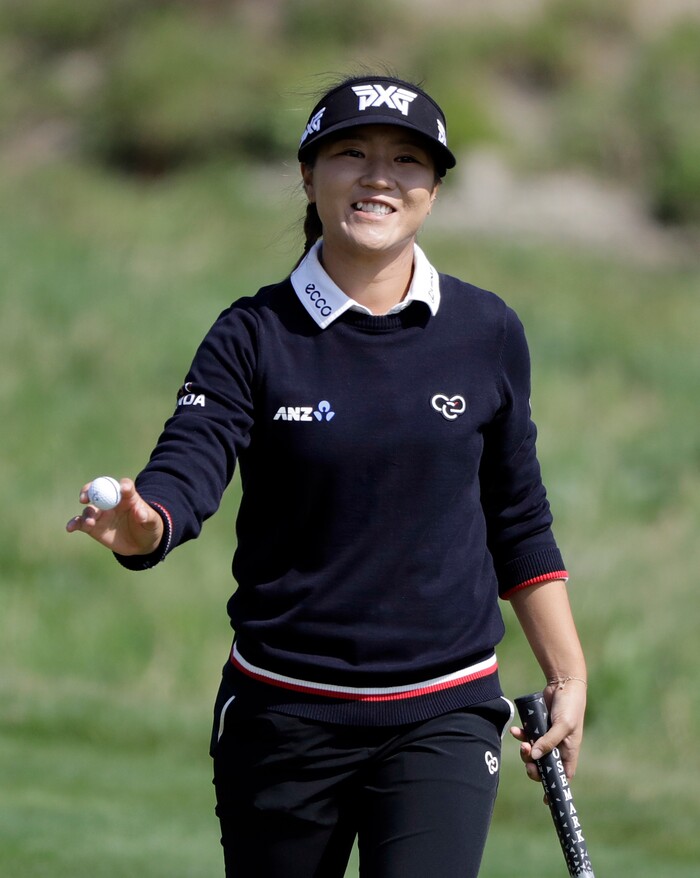 Lydia Ko, of New Zealand, smiles after making a birdie on the fifth hole during the final round of the Indy Women in Tech Championship golf tournament, Saturday, Sept. 9, 2017, in Indianapolis. (AP Photo/Darron Cummings)