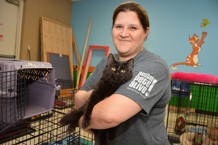 Best Friends Animal Society staff members and volunteers help rescue and reunite pets with people in the aftermath of Hurricane Harvey. Courtesy | Best Friends Animal Society.