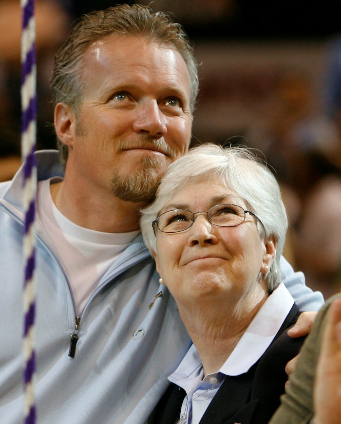 Steve Griffin  |  The Salt Lake Tribune

Greg Miller hugs Gail Miller, his mother, after a Larry Miller jersey was unveiled in the rafters of EnergySolutions Arena during a halftime presentation Wednesday.