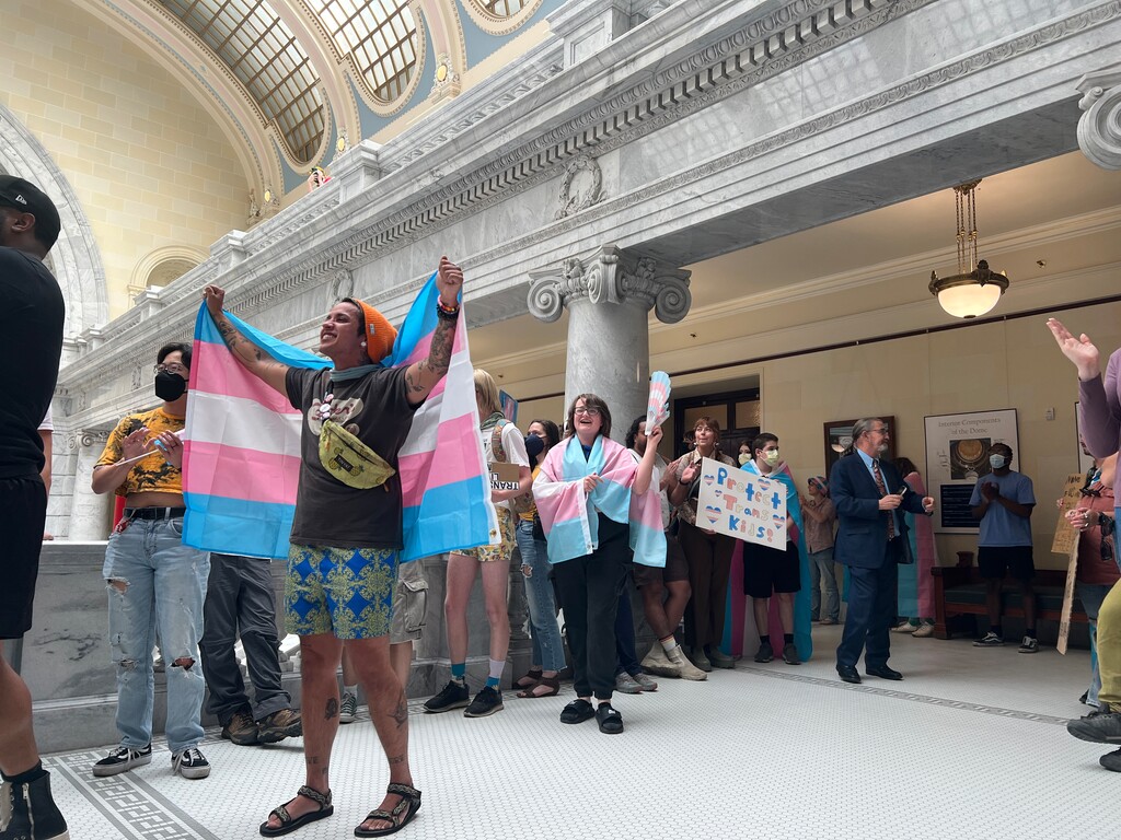(Jeff Parrott | The Salt Lake Tribune) Activists in support of transgender rights protest at the Utah Capital as lawmakers are called into a special legislative session on June 19, 2024.