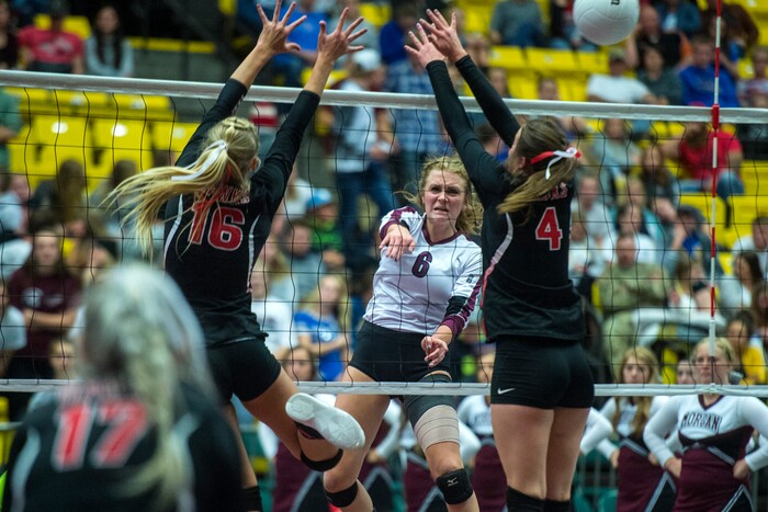 (Chris Detrick  |  The Salt Lake Tribune)  Morgan's Baylee Loertscher (6) spikes past North Sanpete's Kelsie Nielson (16) and North Sanpete's Allyssa Ericksen (4) during the the 3A volleyball state championships at the UCCU Center at Utah Valley University Thursday, October 26, 2017.  Morgan defeated North Sanpete 3-0.