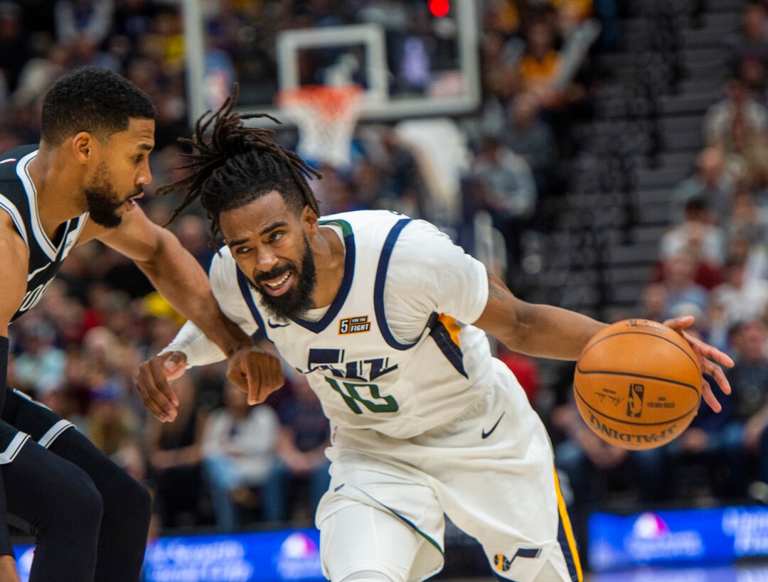 (Rick Egan  |  The Salt Lake Tribune)        Utah Jazz guard Mike Conley (10) drives inside with the ball, as Brooklyn Nets guard Garrett Temple (17) defends, in NBA basketball action between the Utah Jazz and the Brooklyn Nets in Salt Lake City, Tuesday, Nov 12, 2019.