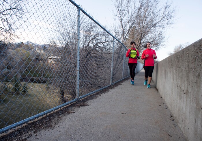 (Rick Egan  |  The Salt Lake Tribune)  Becky Andrews and Alanna Whetsel train for the Boston Marathon by running along David Boulevard in Bountiful, Thursday, March 29, 2018.