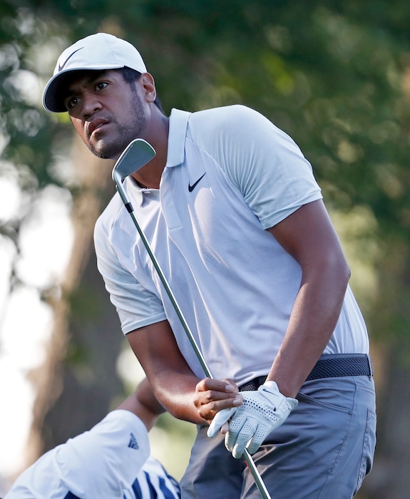 (AP Photo/Jeff Roberson) Tony Finau watches his tee shot on the 11th hole during the first round of the PGA Championship golf tournament at Bellerive Country Club, Thursday, Aug. 9, 2018, in St. Louis.