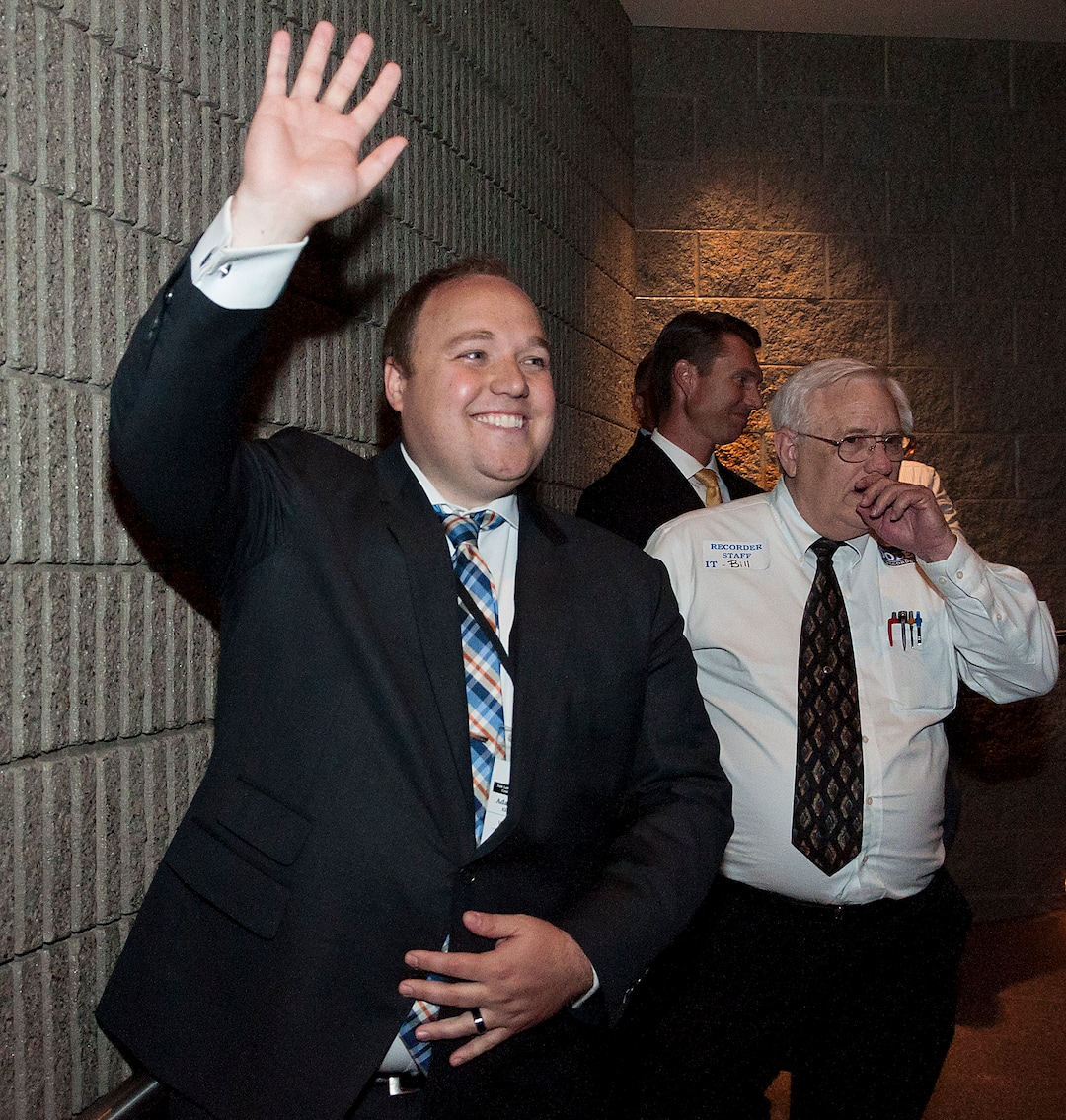 (Michael Mangum  |  Special to the Tribune)  Adam Gardiner waves after winning the election for Salt Lake county recorder during the county republican Central Committee Meeting at Jordan High School in Sandy, UT on Thursday, August 17, 2017.