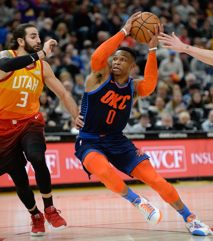 (Francisco Kjolseth  |  The Salt Lake Tribune)   Oklahoma City Thunder guard Russell Westbrook moves past Utah Jazz guard Ricky Rubio (3) in the second half of the NBA game at Vivint Smart Home Arena Sat., Dec. 22, 2018, in Salt Lake City.