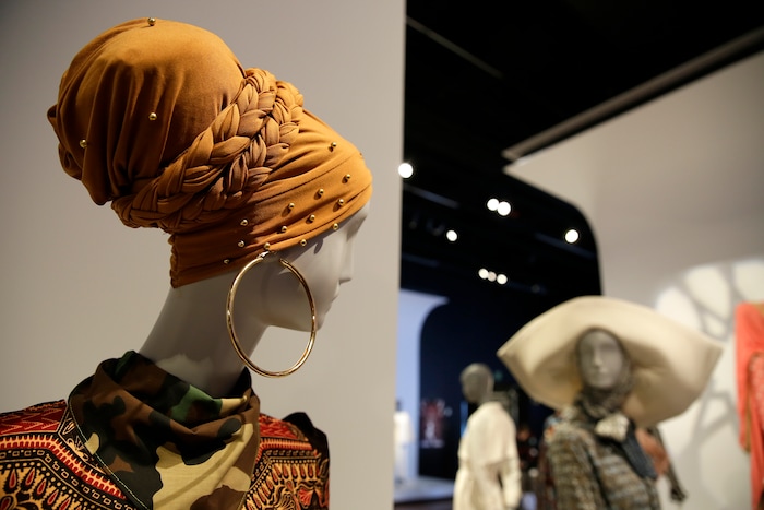 (Eric Risberg  |  AP Photo)  In this photo taken Thursday, Sept. 20, 2018, a headscarf and wrap is displayed in the exhibit Contemporary Muslim Fashions at the M. H. de Young Memorial Museum in San Francisco. The first major museum exhibition of contemporary Muslim women's fashion reflects designs from around the world that are vibrant and elegant, playful and diverse. The show's creators hope the exhibit will show Muslim women as real people who can choose what they wear rather than as subjects ordered to cover their entire bodies or restricted in what they can wear. The exhibit opens on Saturday. 