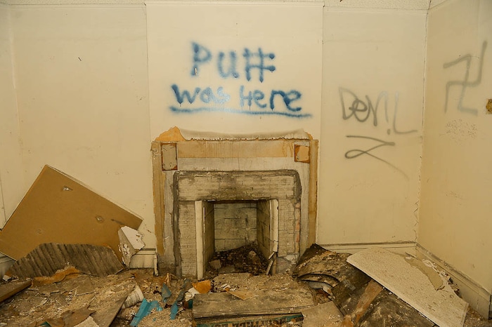(Trent Nelson | The Salt Lake Tribune) A dilapidated, fire-damaged building near 100 South 700 East in Salt Lake City, Thursday Feb. 15, 2018. Other Side Academy has received approval to demolish it for their expansion.