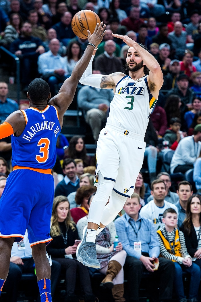 (Chris Detrick  |  The Salt Lake Tribune)  Utah Jazz guard Ricky Rubio (3) passes around New York Knicks forward Tim Hardaway Jr. (3) during the game at Vivint Smart Home Arena Friday, January 19, 2018.  