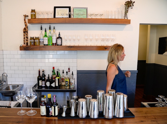 (Francisco Kjolseth  |  The Salt Lake Tribune)  Angelena Fuller, owner and manager of Oquirrh, a new fine-dining restaurant in downtown Salt Lake City, attends to customers on Thursday, July 18, 2019.