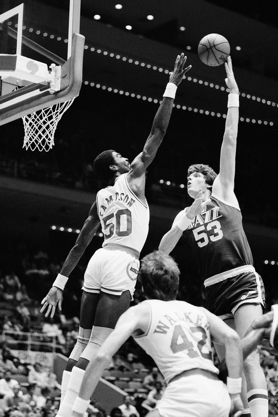 (R.J. Carson | AP file photo) Utah Jazz 7'4" center Mark Eaton puts a hook shot up and over the outstretched hand of Houston Rocket center Ralph Sampson in first period action at the Summit in Houston November 11, 1983.