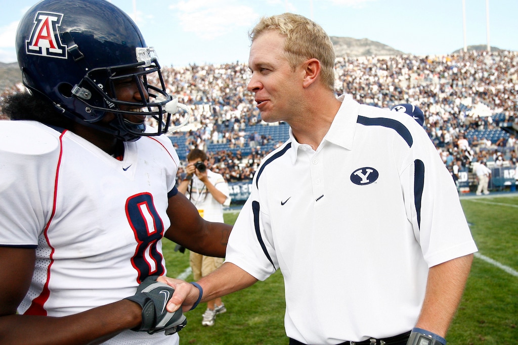 (Chris Detrick | The Salt Lake Tribune) BYU coach Bronco Mendenhall shakes hands with Arizona's Dominic Patrick during the second half of the game in 2007. Mendenhall is taking over as head coach of New Mexico.
