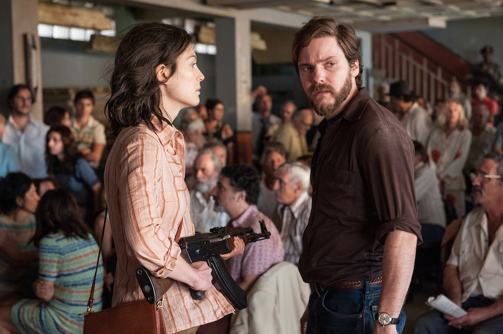 (Liam Daniel | Focus Features) Rosamund Pike as Brigitte Kuhlman and Daniel Brühl as Wilfred Böse in the new film by José Padilha, "7 Days in Entebbe."