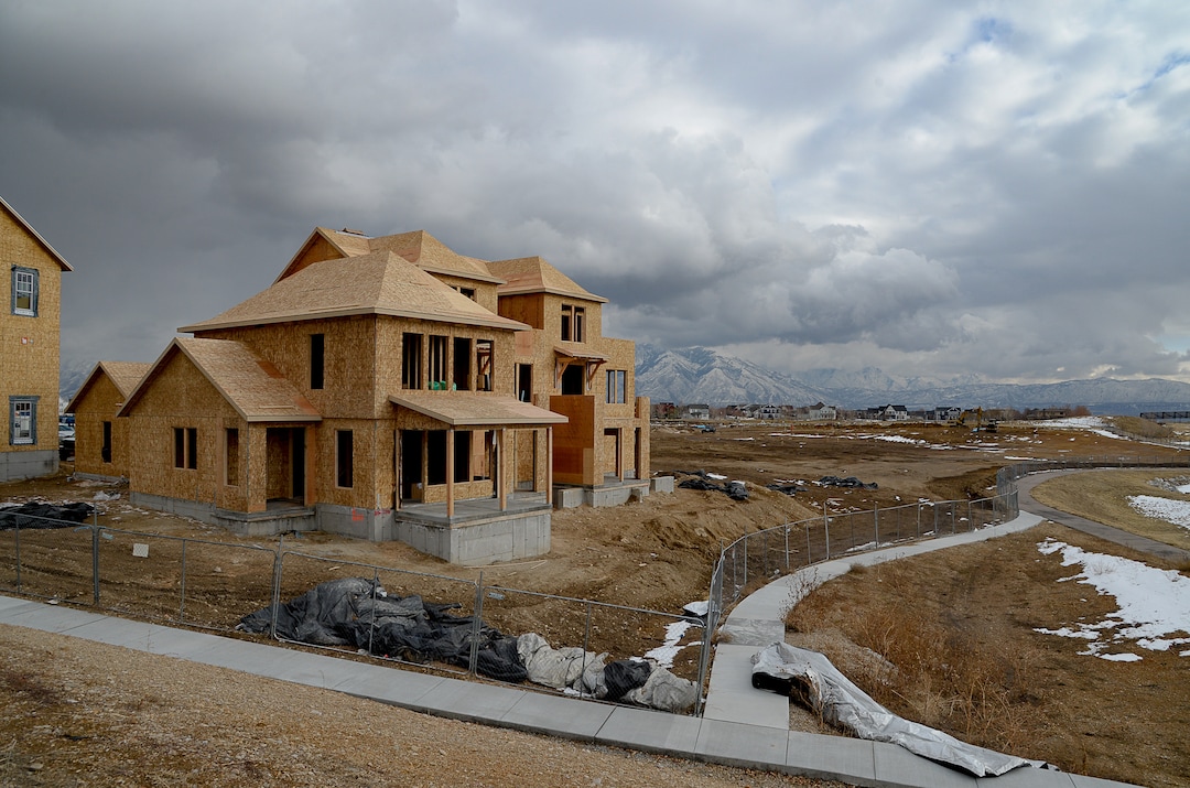 (Francisco Kjolseth  |  The Salt Lake Tribune) Ongoing development takes shape around Oquirrh Lake at Daybreak on Thursday, Jan. 9, 2020. Daybreak, the 4,100-acre master planned community in South Jordan, illustrates the idea of blending higher density housing and walkable community design with ample amounts of open space. That "smart growth" land use approach is being required by Salt Lake County for a proposed development called Olympia Hills, a 933-acre residential and commercial project proposed west of Herriman.