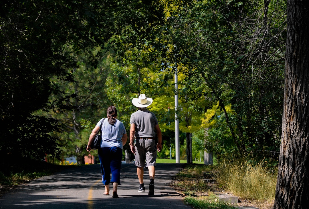 (Francisco Kjolseth  |  The Salt Lake Tribune) People recreate near the International Peace Gardens along the Jordan River Parkway on Wednesday, August 5, 2020, as new grant money becomes available to refresh the comprehensive master plan for the 51-mile parkway stretching from Utah Lake in Utah County to the wetlands of the Great Salt Lake.
