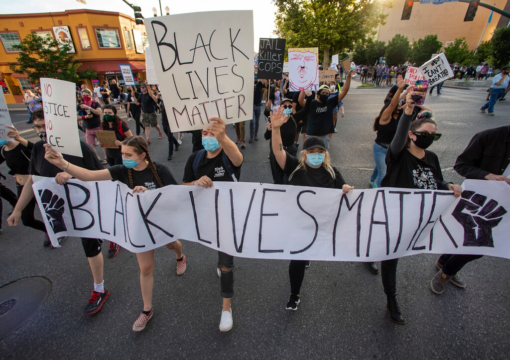 (Rick Egan  |  The Salt Lake Tribune)   Black Lives Matter protesters march down Center Street, to the City and County Building in Provo, Wednesday July 1, 2020.