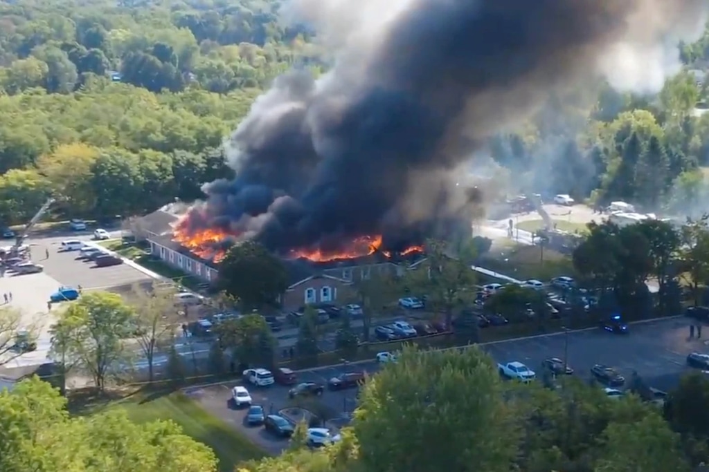 (Julie J, @Malkowski6April via AP) Flames and smoke rise from a meetinghouse of The Church of Jesus Christ of Latter-day Saints in Grand Blanc, Michigan, about 50 miles north of Detroit, Sunday, Sept. 28, 2025.